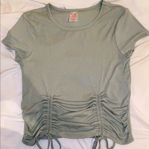 Brand new, sage green form fitting shirt.